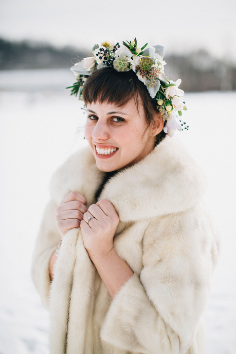 bride in flower crown and fur coat