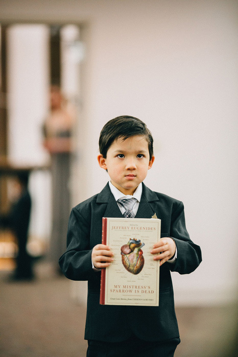 ring bearer carrying book