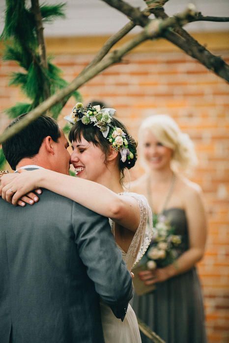 bride and groom first kiss