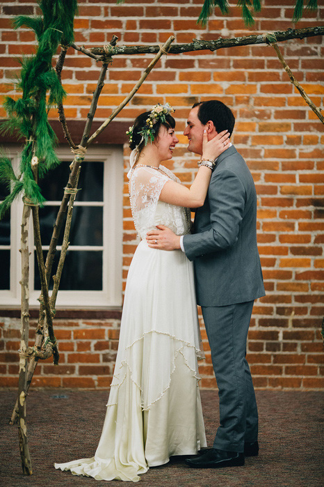 bride and groom first kiss