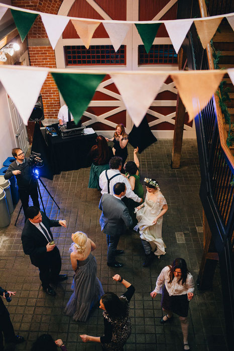 guests dancing at barn wedding