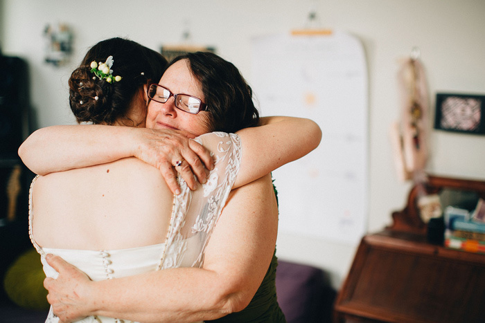 bride hugging mother