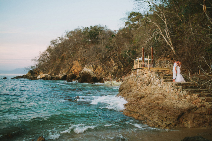 bride and groom portrait by the ocean