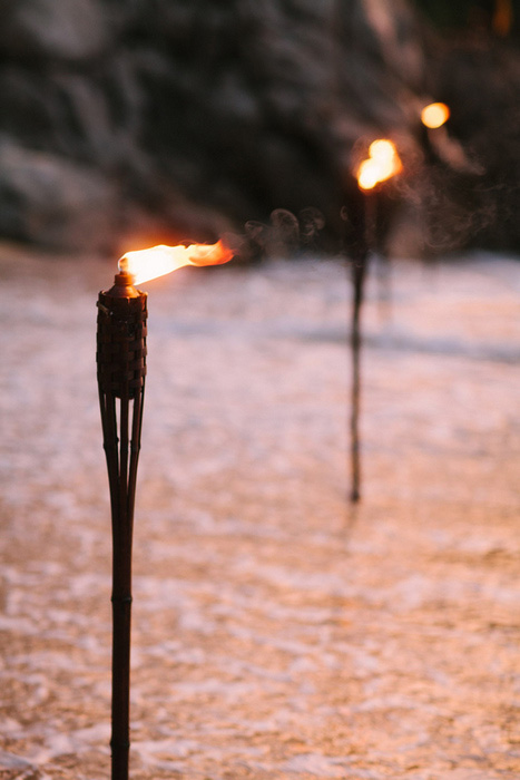 tiki torches on beach