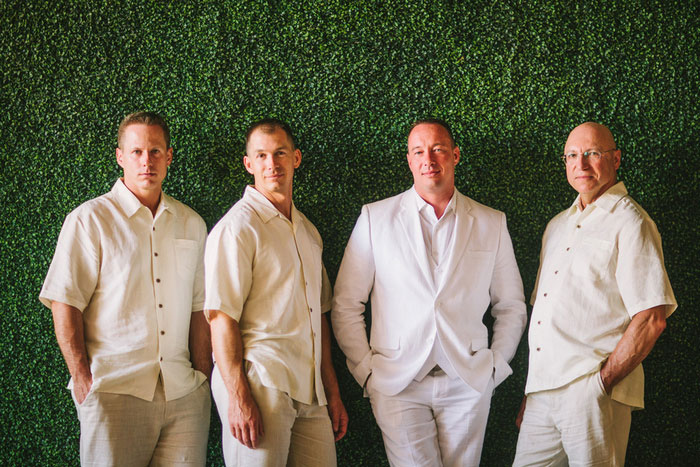 groomsmen in white