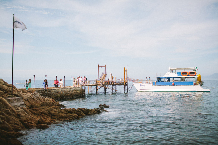 wedding guests arriving by boat