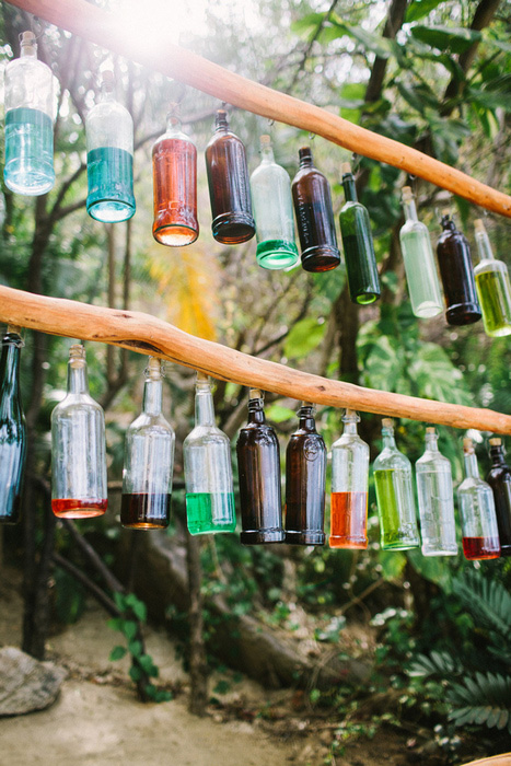 bottles full of colored liquid