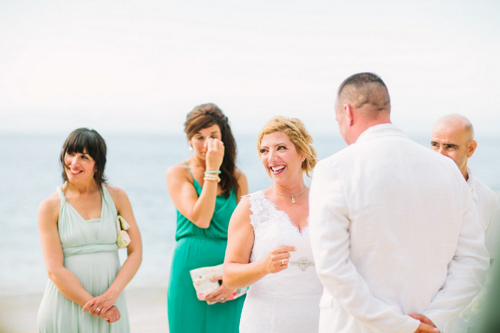 laughing bride during ceremony