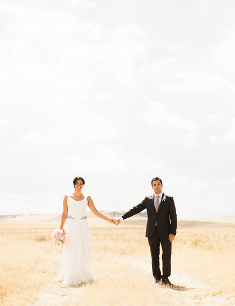 bride and groom in spanish countryside