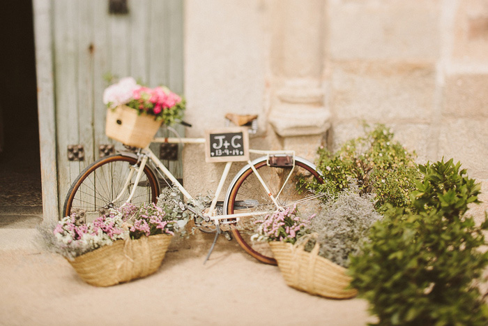 bike with wedding sign and flowers