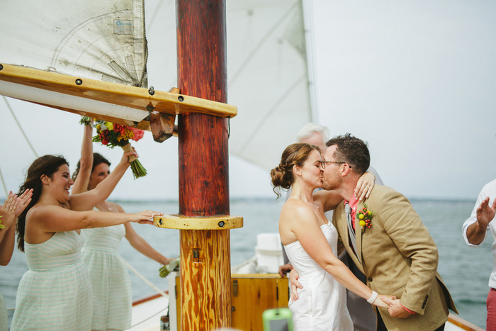 bride and groom first kiss