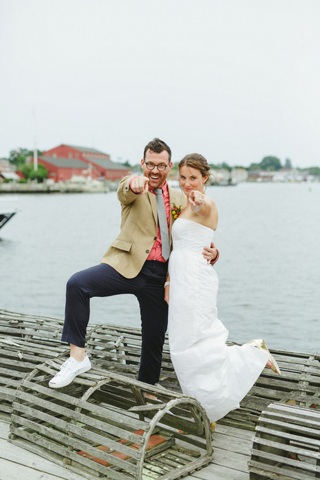 bride and groom portrait with lobster traps