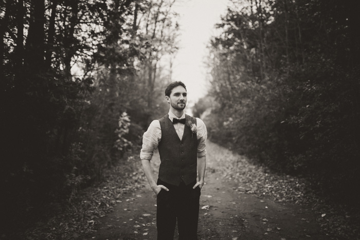 black and white groom portrait