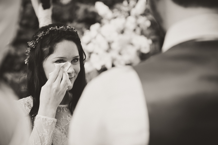 bride crying during ceremony