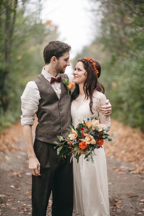 bride and groom in the woods