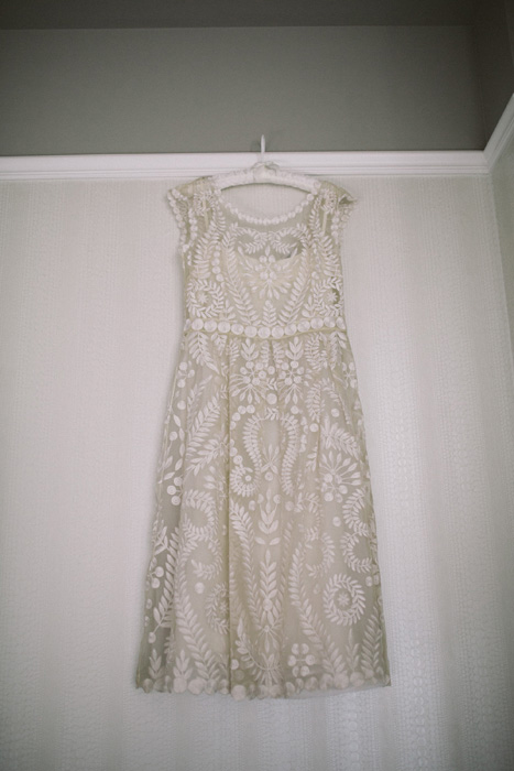 short wedding dress hanging up