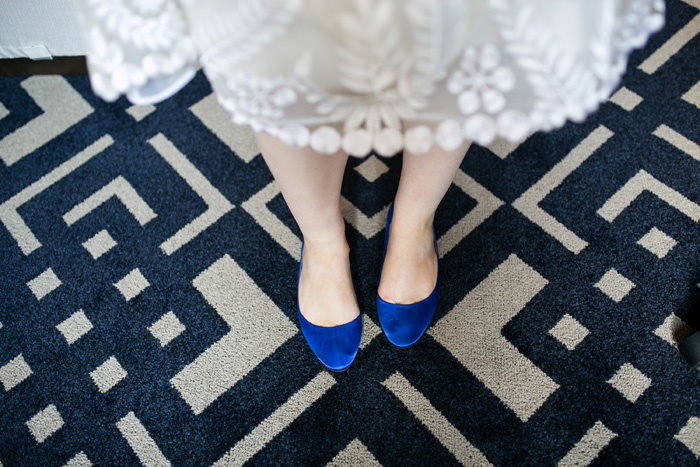 bride in blue suede shoes