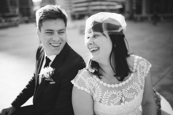 bride and groom laughing