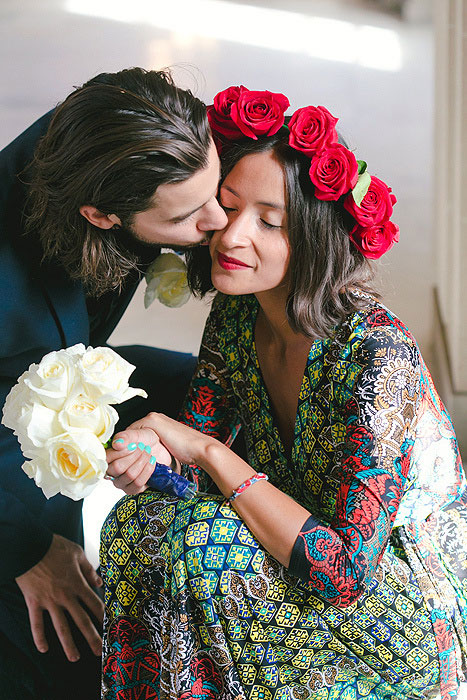 groom kissing bride's cheek