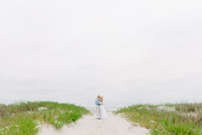 bride and groom at the beach