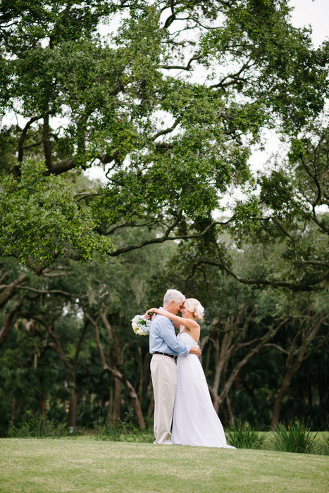 bride and groom embracing 