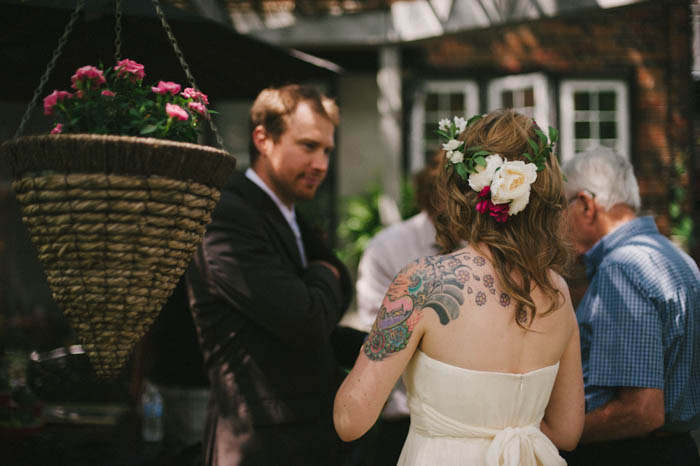 bride and groom at backyard reception 
