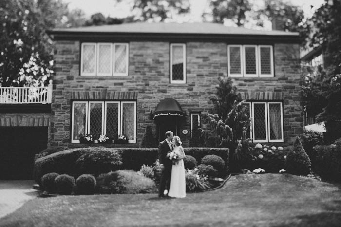 wedding portrait in front of house