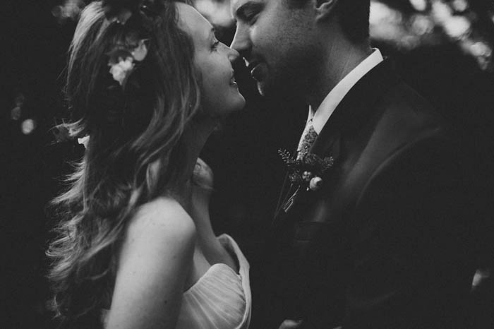 bride and groom about to kiss