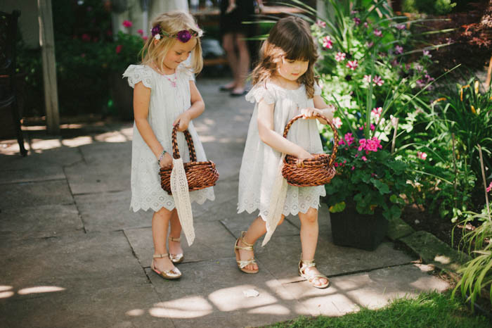 flower girls walking down the aisle