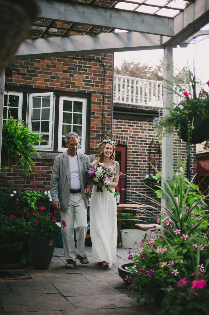 bride walking with her father down the aisle