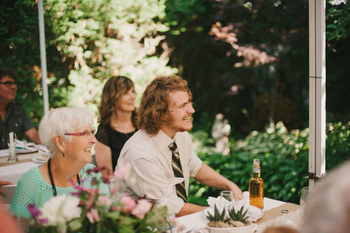 wedding guests at backyard wedding reception