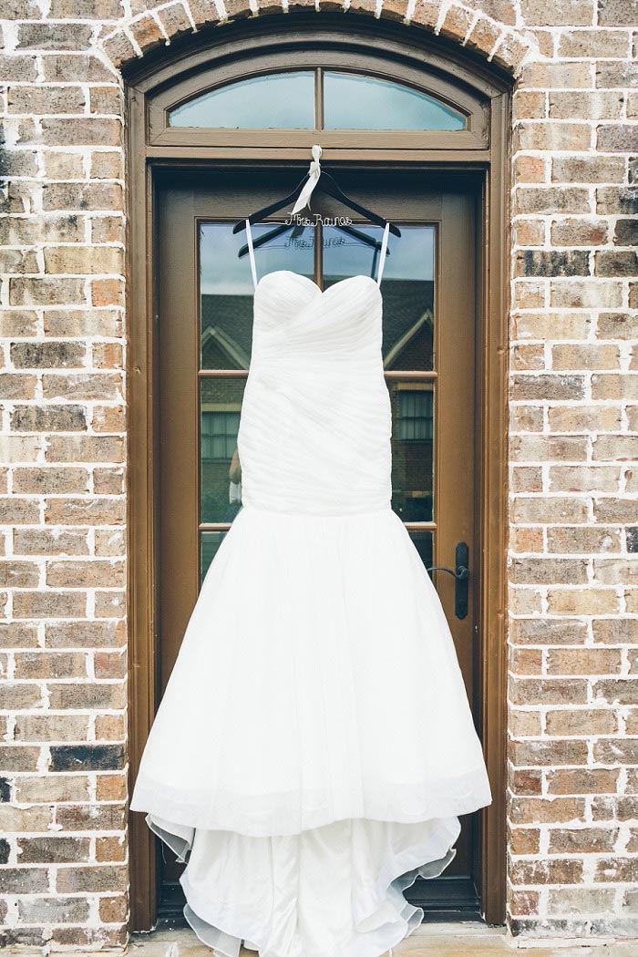 wedding dress hanging up outside