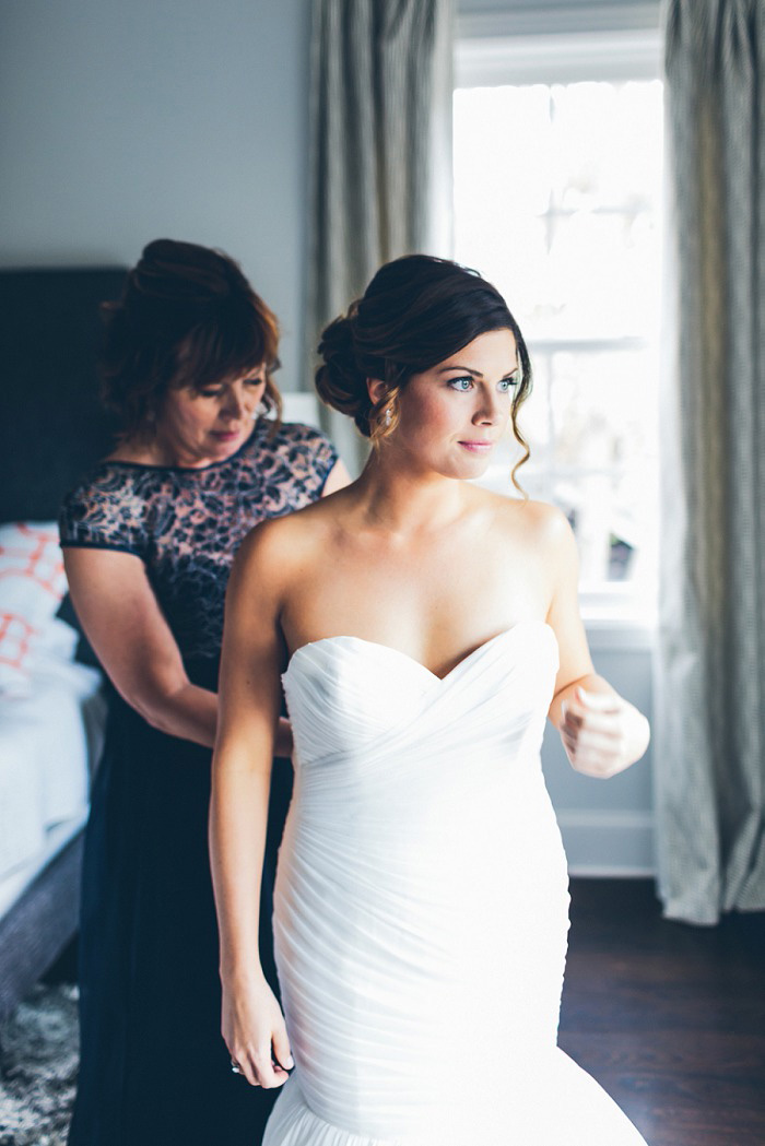 bride getting dressed