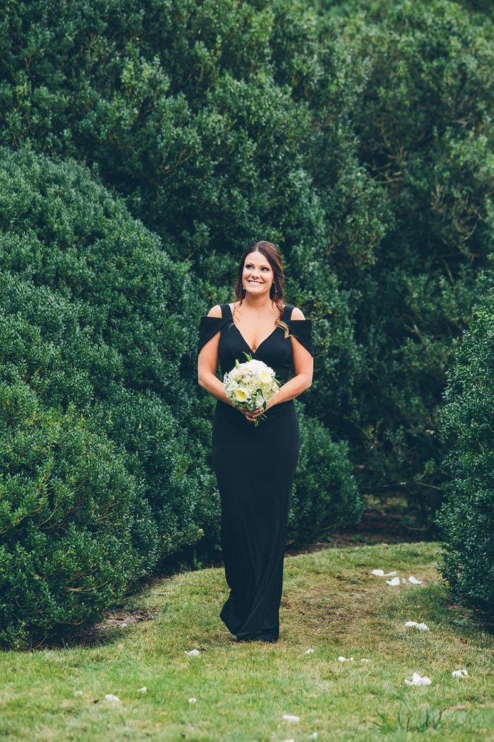 bridesmaid walking down the aisle