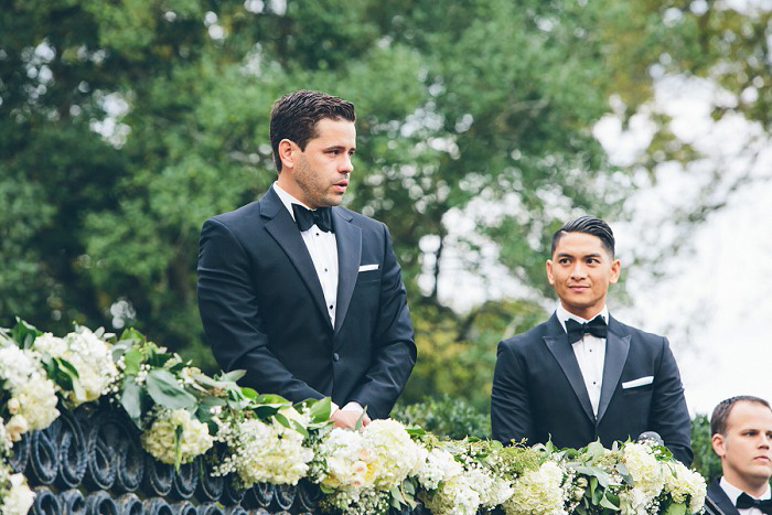 groom waiting at the altar