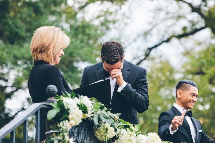 groom getting emotional at the altar