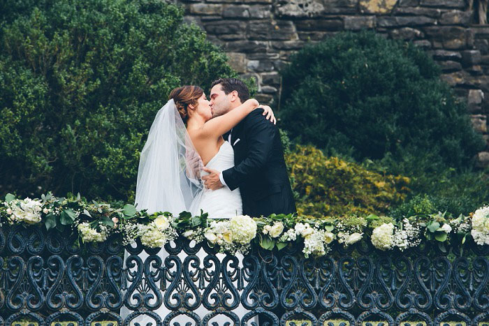 bride and groom first kiss