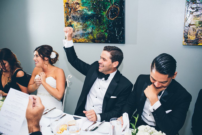 groom at reception dinner