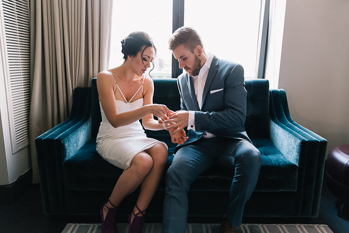 bride and groom getting ready together