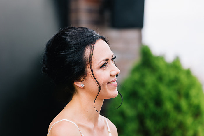 smiling bride during ceremony