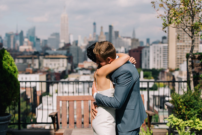 bride and groom hugging during ceremony