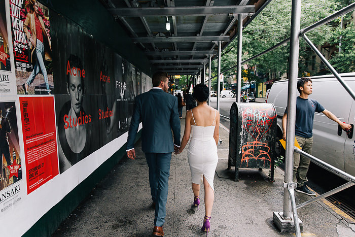 bride and groom walking in New York