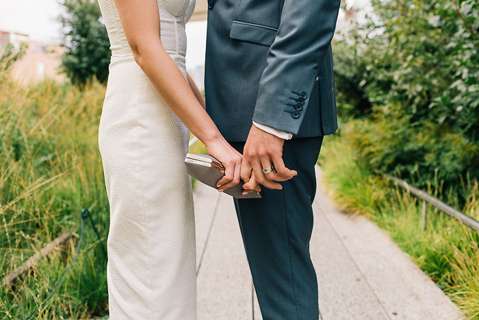 bride and groom facing eachother