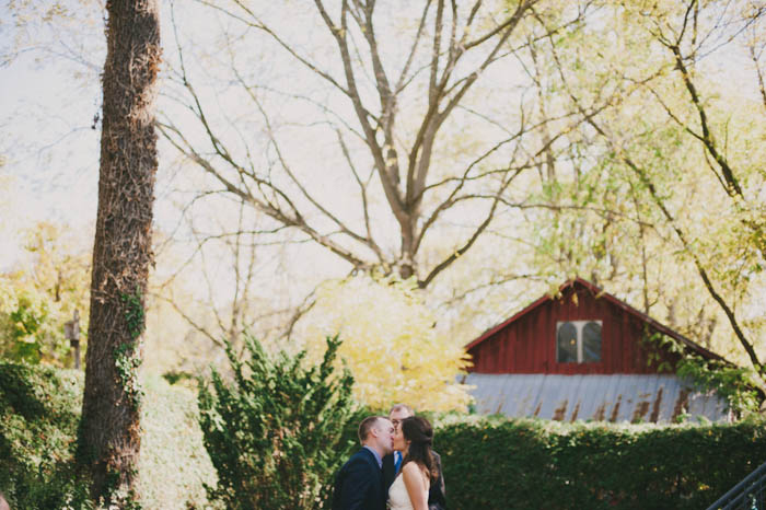 bride and groom first kiss