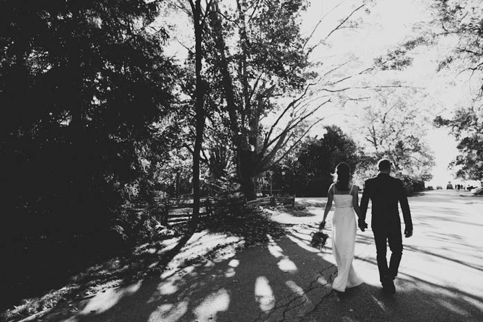 bride and groom walking down the street