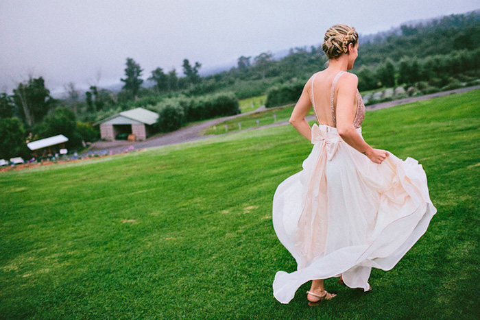 bride running on the grass