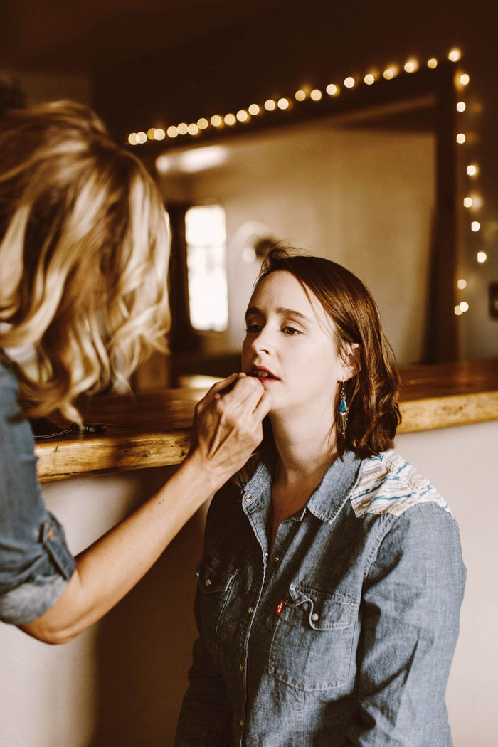 bride getting her make-up done