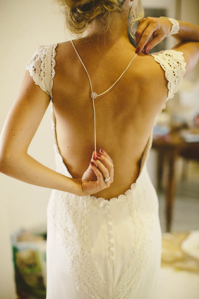 bride adjusting back chain