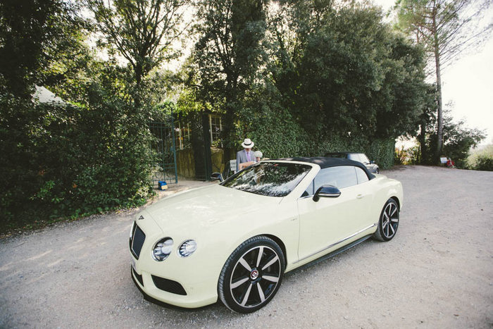 bride getting into car