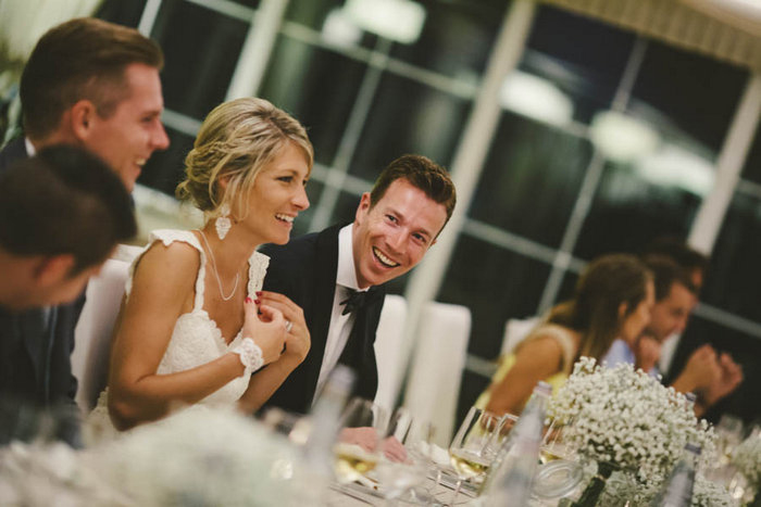 bride and groom at reception dinner